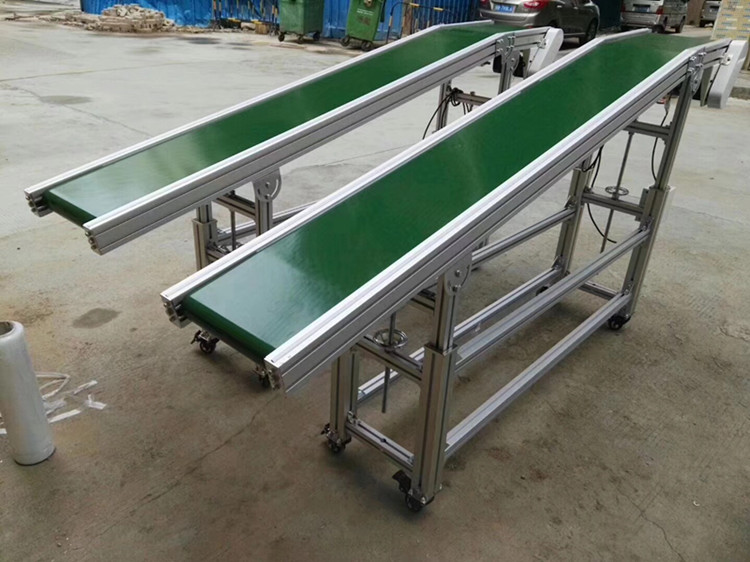 爬坡提升輸送機(jī)選擇東莞金泰，助您一臂之力